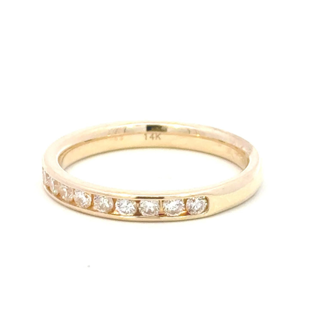 0.52 carat natural diamond round brilliant channel band - size 6.5 in 14k yellow gold