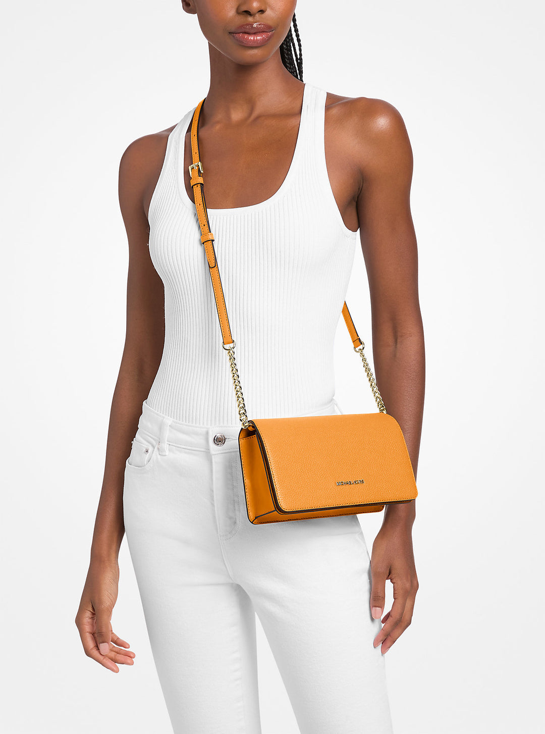 jet set travel medium pebbled leather crossbody bag