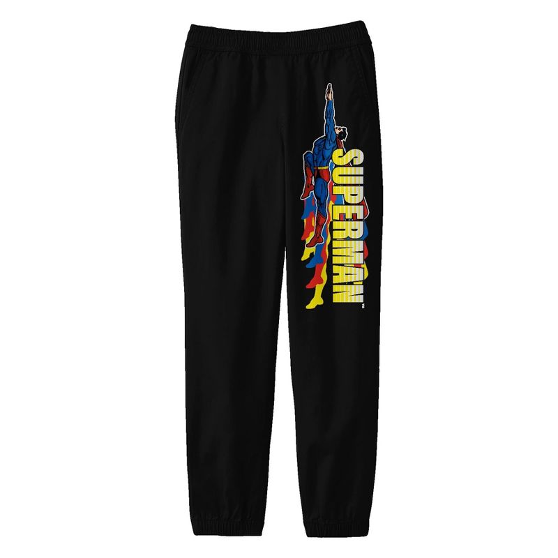 Superman Flying With Vertical Title Logo Youth Black Graphic Sweatpants