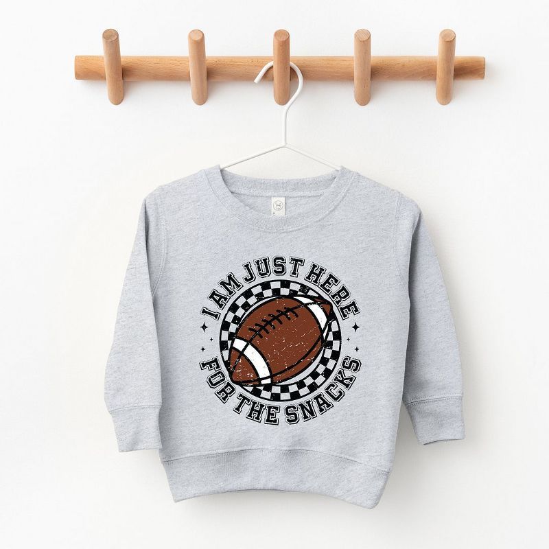 The Juniper Shop I Am Just Here For The Snacks Youth Ultra-Soft Graphic Sweatshirt