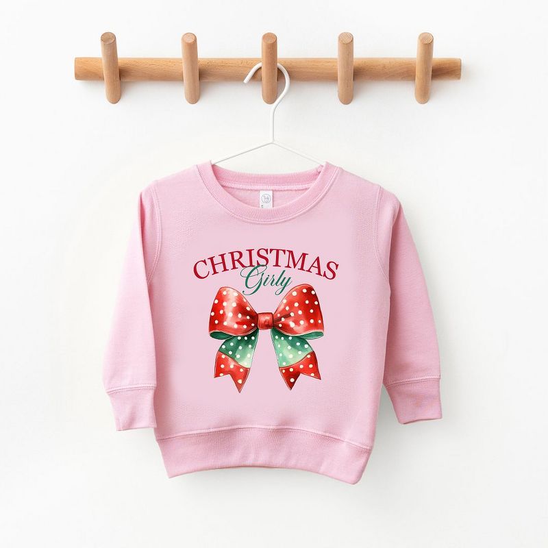 The Juniper Shop Coquette Christmas Girly Toddler Graphic Sweatshirt