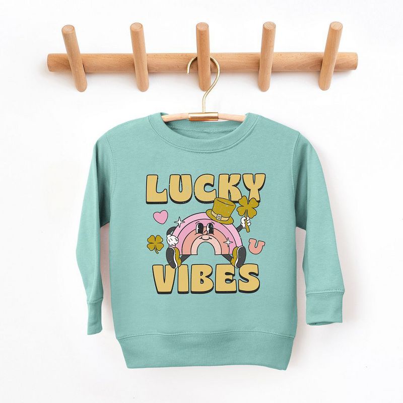 سويت شيرت جرافيكي للأطفال الصغار برسومات قوس قزح كرتونية من متجر جونيبر