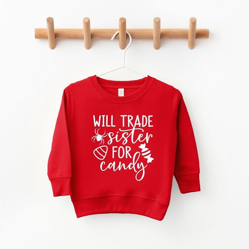 The Juniper Shop Will Trade Sister For Candy Toddler Graphic Sweatshirt