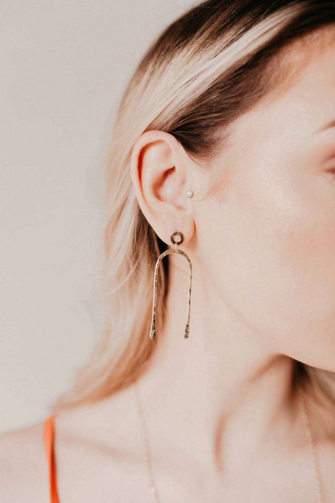 women's arch post earrings in gold
