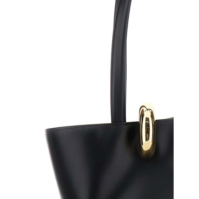 le Bambola Moyen Black Shoulder Bag With Front Metal Ring Closure And Embossed Logo Lettering On The Front In Leather