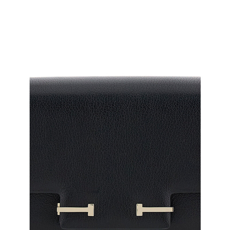 Black Crossbody Bag With Adjustable Shoulder Strap And T Plaque Closure In Grained Leather