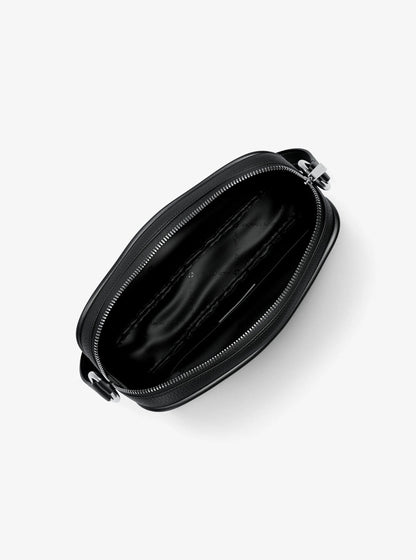 jet set travel large logo debossed camera crossbody bag