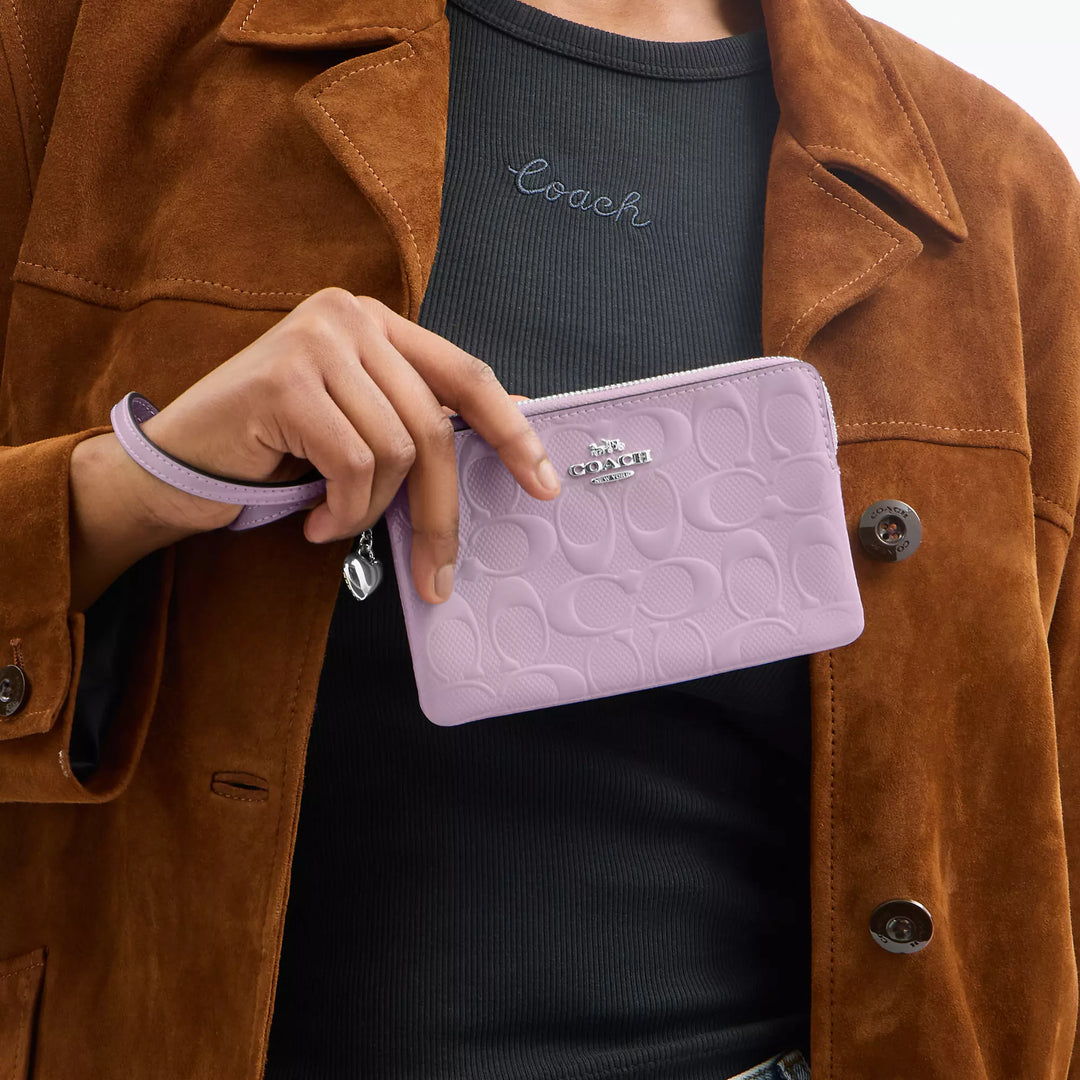 corner zip wristlet in signature leather with heart charm