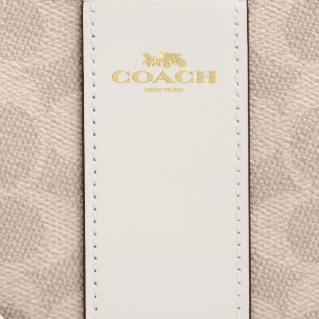 corner zip wristlet in signature canvas with stripe