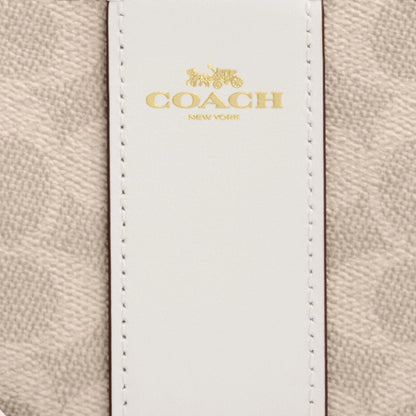 corner zip wristlet in signature canvas with stripe
