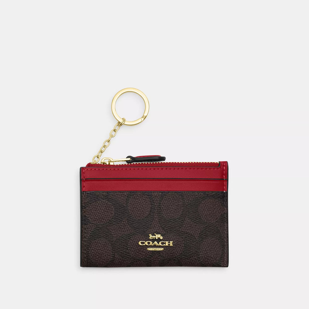 mini skinny id case in signature canvas