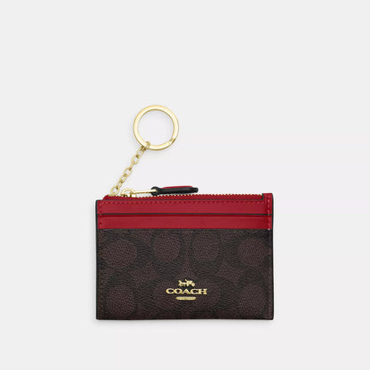 mini skinny id case in signature canvas