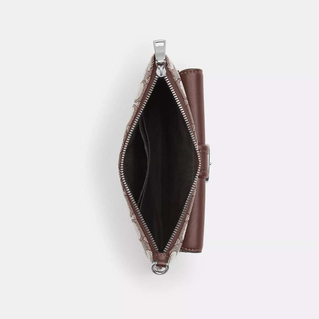 ashton wristlet in signature jacquard