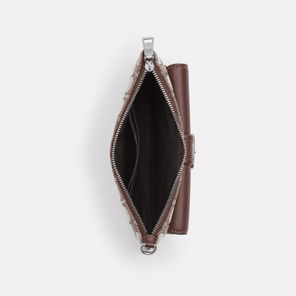ashton wristlet in signature jacquard