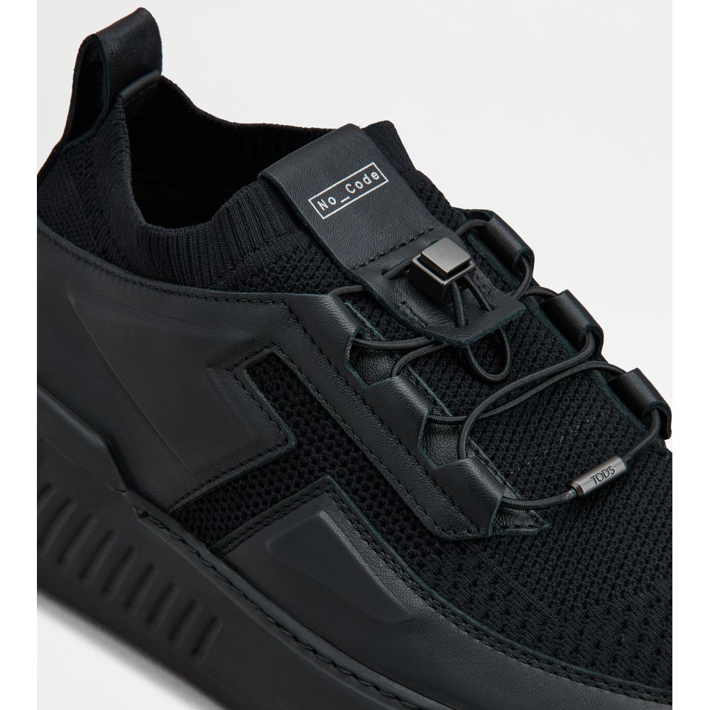 no_code x in leather and technical fabric