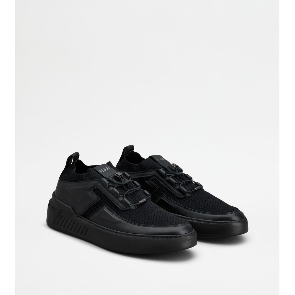 no_code x in leather and technical fabric