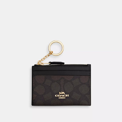 mini skinny id case in signature canvas
