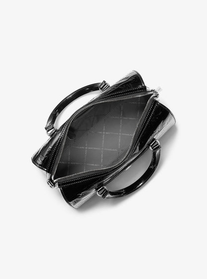 jet set medium patent logo debossed duffel crossbody bag