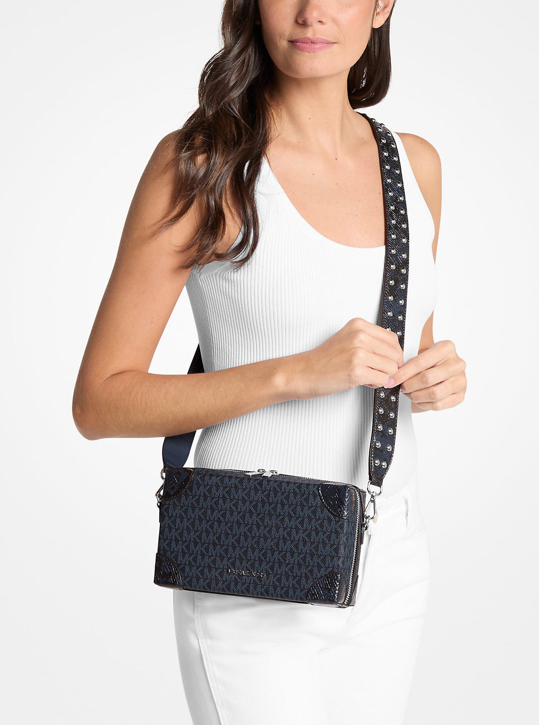 jeanie small signature logo and snake embossed crossbody bag