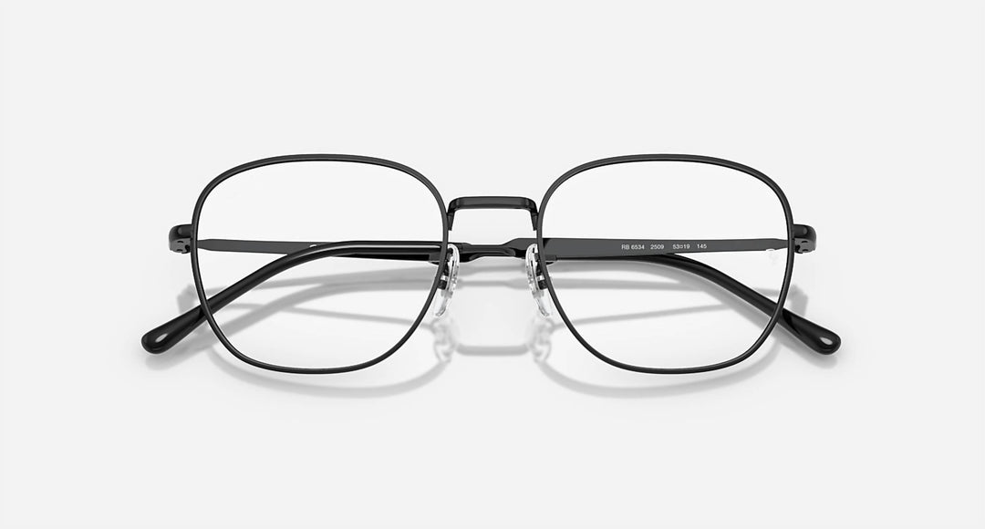 men's rx6534 metal eyeglass prescription frames in matte matte black on matte grey
