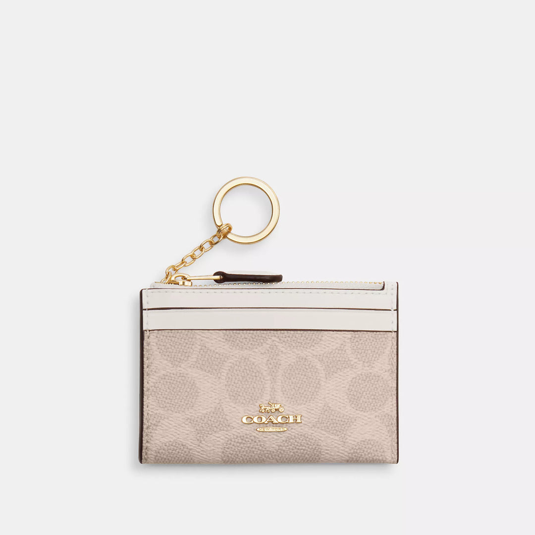 mini skinny id case in signature canvas