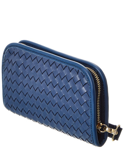 nora hand-woven leather clutch