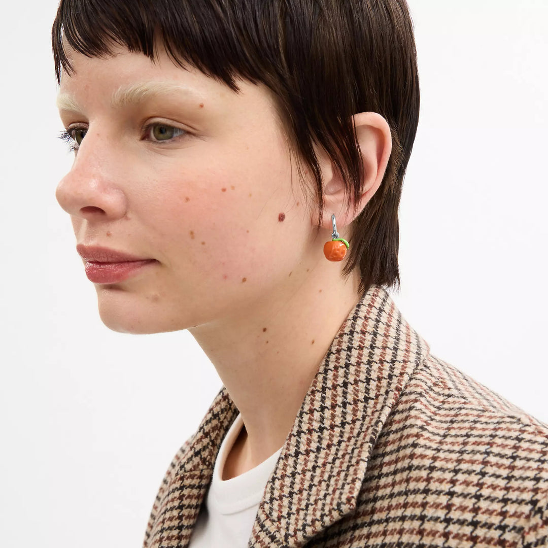 orange huggie earrings