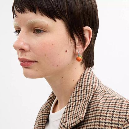 orange huggie earrings