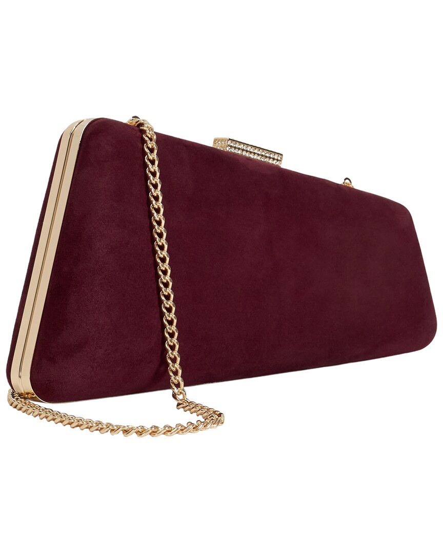 balancing suede clutch