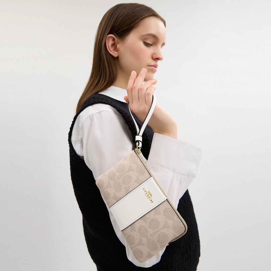 corner zip wristlet in signature canvas with stripe