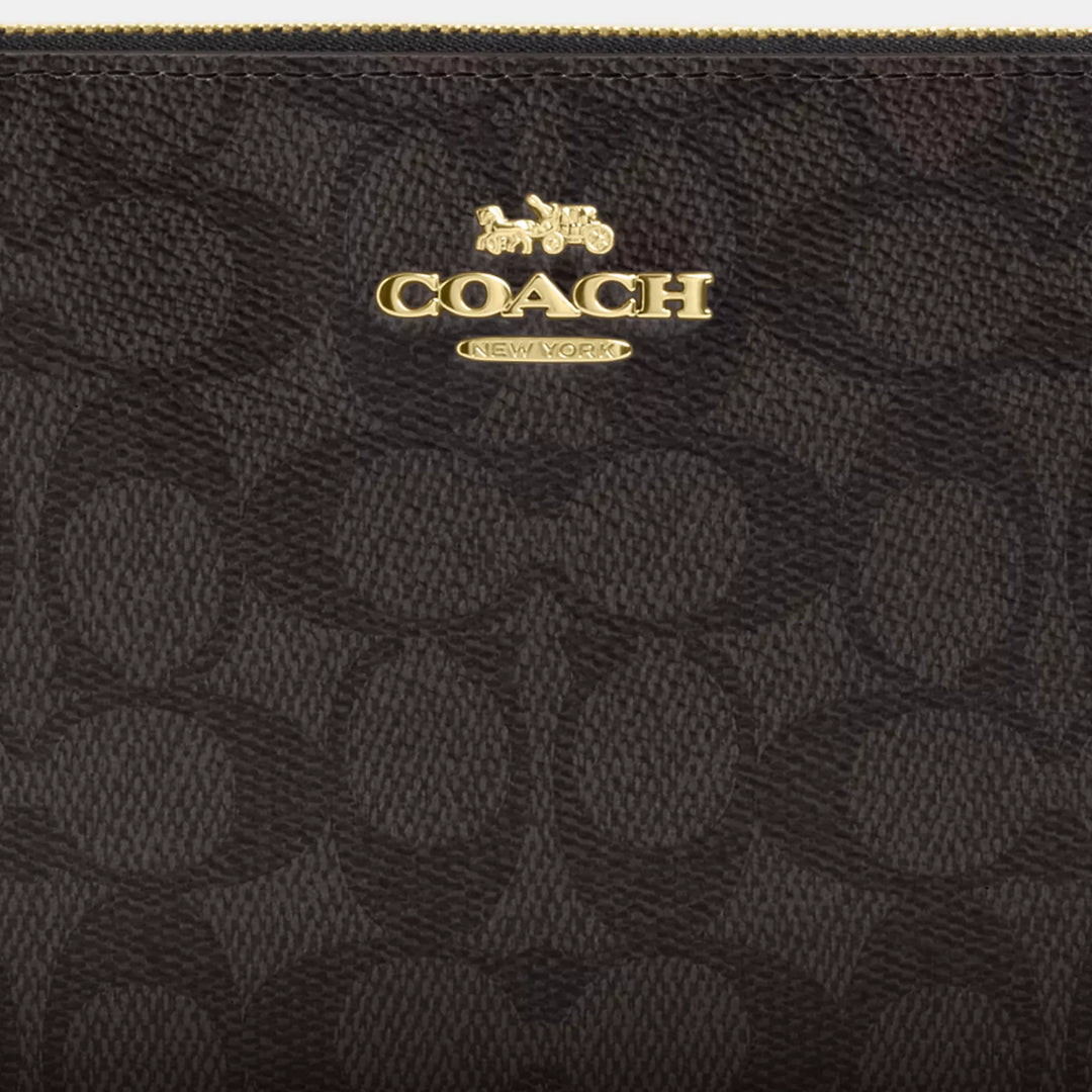 large corner zip wristlet in signature canvas