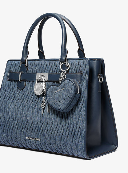jet set travel matelassé denim heart coin pouch