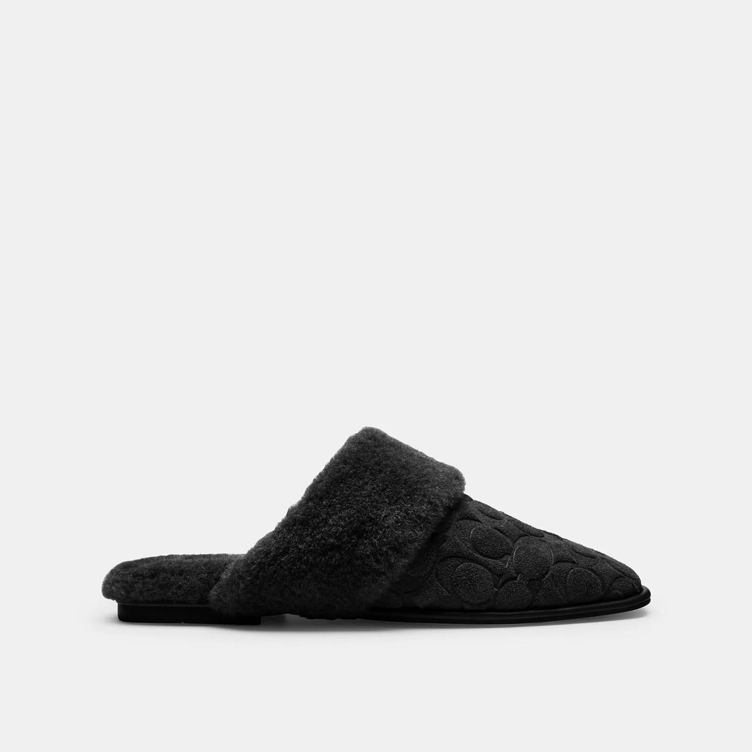 sherpa flat mule in signature suede