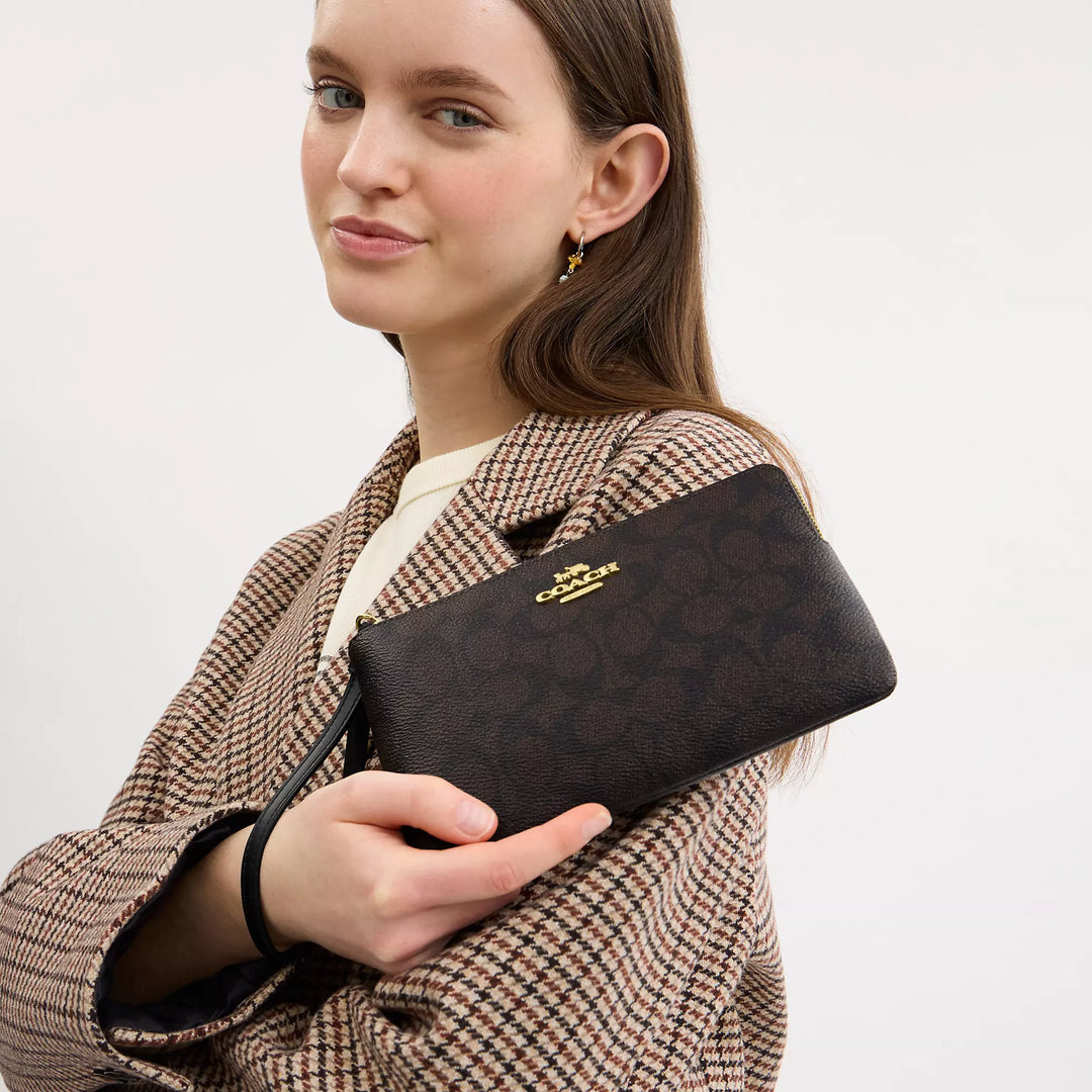 large corner zip wristlet in signature canvas