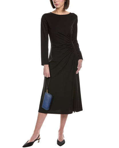 nora hand-woven leather clutch