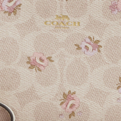 corner zip wristlet in signature canvas with floral print
