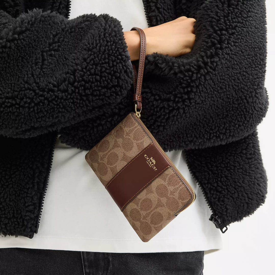 corner zip wristlet in signature canvas with stripe