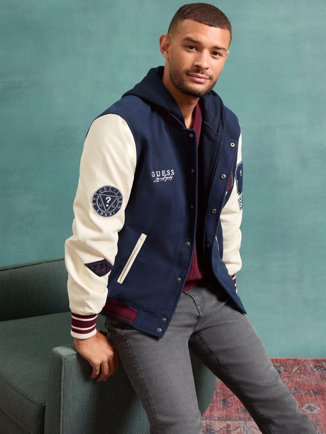 mark hooded varsity jacket