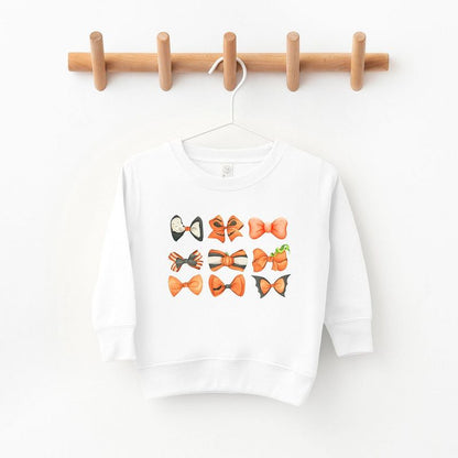 The Juniper Shop Coquette Girl Halloween Bow Chart Toddler Graphic Sweatshirt