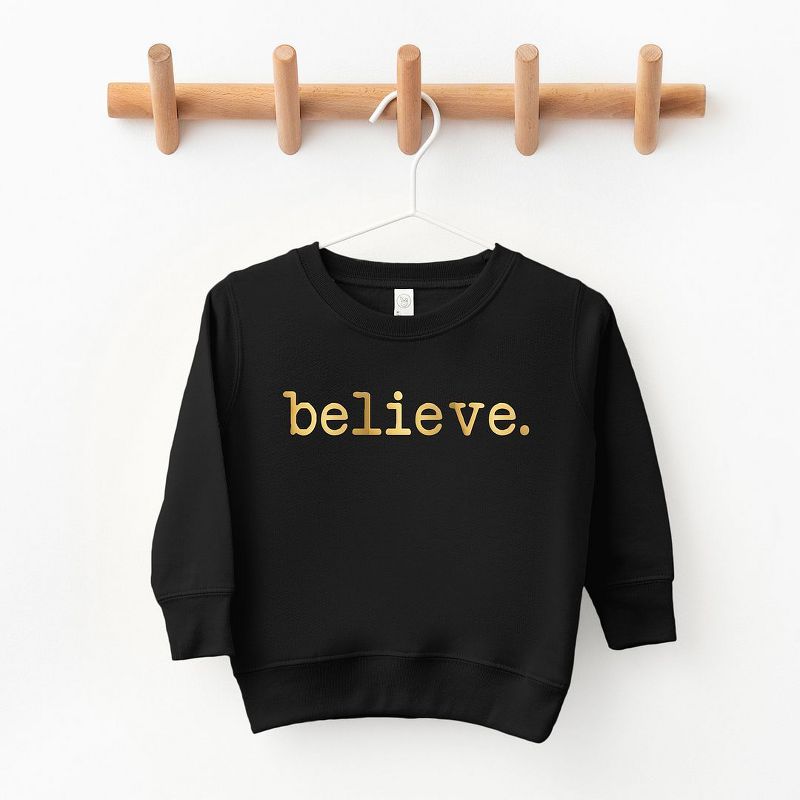 The Juniper Shop Believe Puff Print Toddler Graphic Sweatshirt