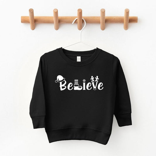 The Juniper Shop Believe Christmas Toddler Graphic Sweatshirt
