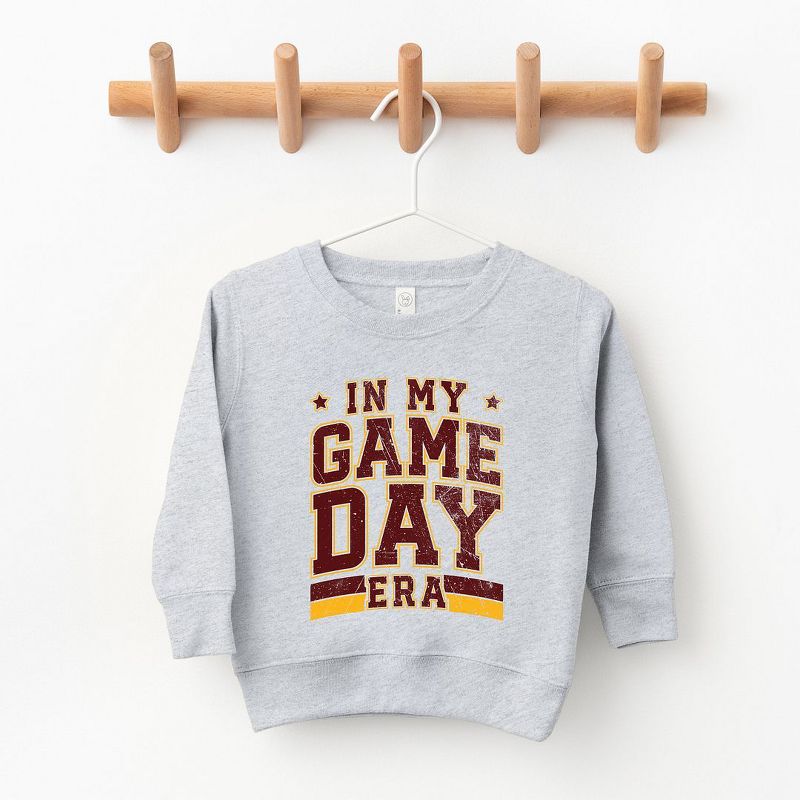 متجر جونيبر في عصر يوم لعبتي - سويت شيرت رسومي ناعم للغاية للشباب باللون الكستنائي