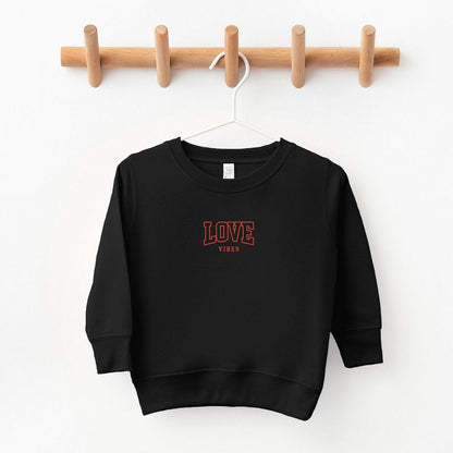 The Juniper Shop Embroidered Varsity Love Vibes Toddler Graphic Sweatshirt