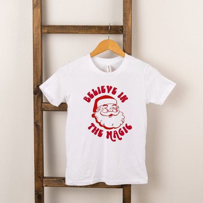 تي شيرت بأكمام قصيرة للشباب من Juniper Shop Believe In The Magic Santa