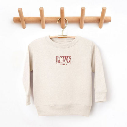 The Juniper Shop Embroidered Varsity Love Vibes Youth Ultra-Soft Graphic Sweatshirt