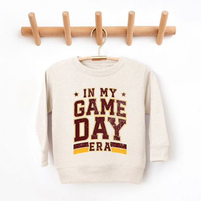متجر جونيبر في عصر يوم لعبتي - سويت شيرت رسومي ناعم للغاية للشباب باللون الكستنائي