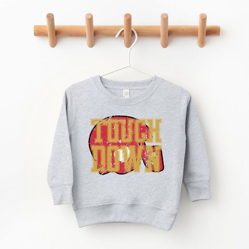 The Juniper Shop Touch Down Red Helmet Distressed Toddler Graphic Sweatshirt