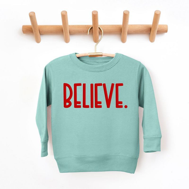 The Juniper Shop Believe Bold Puff Print Youth Ultra-Soft Graphic Sweatshirt