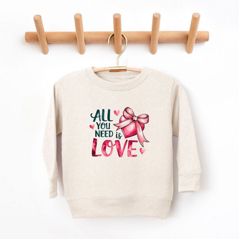 The Juniper Shop All You Need Is Love Coquette Youth Ultra-Soft Graphic Sweatshirt