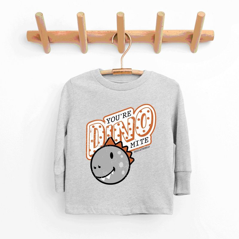 تي شيرت شبابي بأكمام طويلة مطبوع عليه You're Dino-Mite من متجر Juniper Shop SmileyWorld